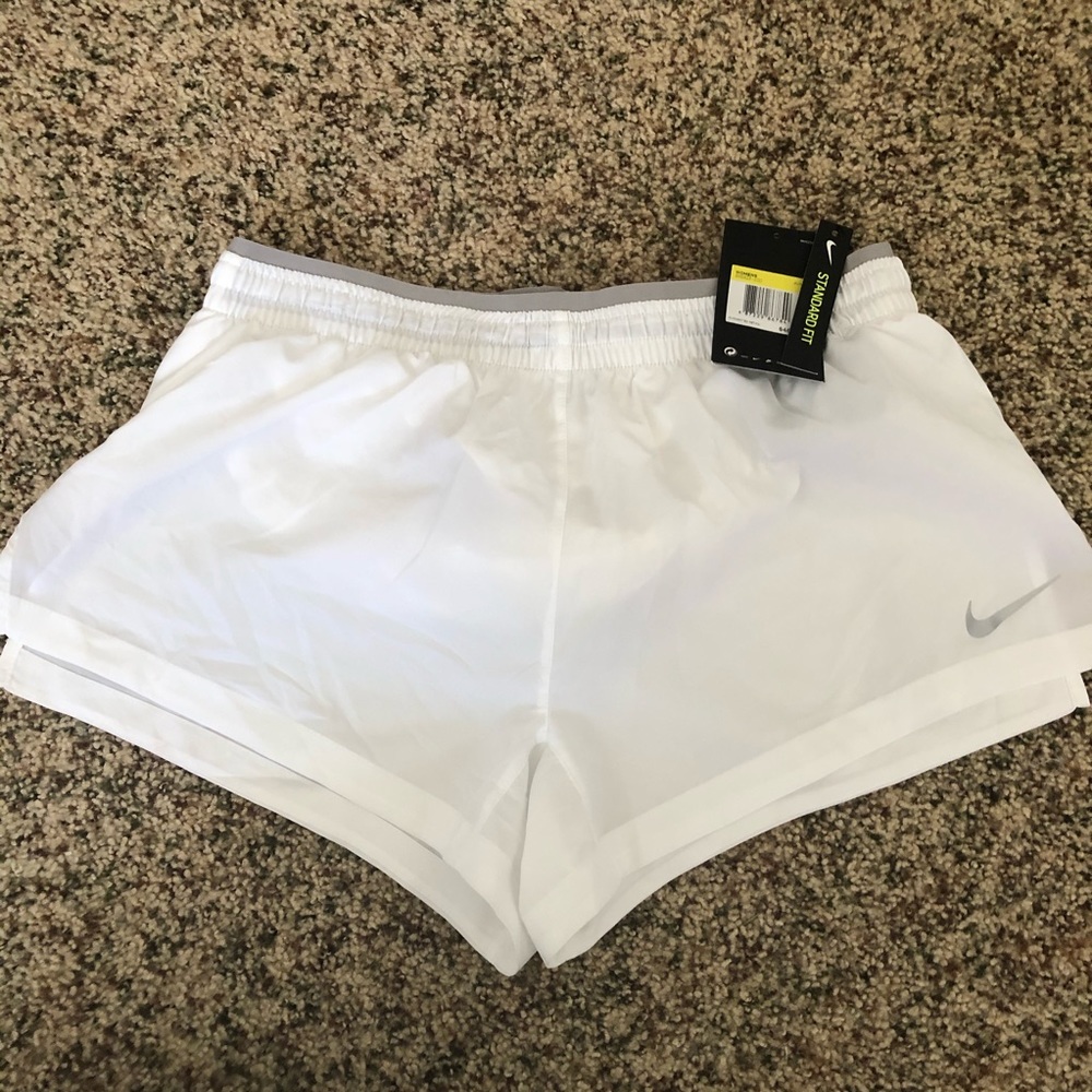 white nike running shorts